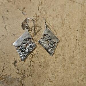 Elegant Sterling And Topaz Earrings with Intricate Design